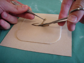 Practising suturing on Duoderm
